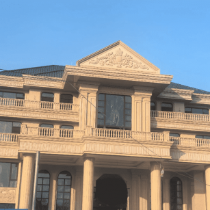 鄂州黄金麻别墅外墙干挂石材效果示例